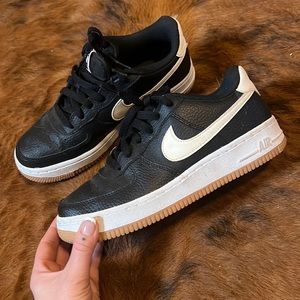 NIKE AIR FORCE 1 black white and gum sole sneakers